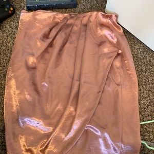 Barely worn New York and company pink satin skirt.